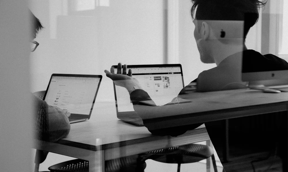 Professional doing sales outreach and lead generation on laptop