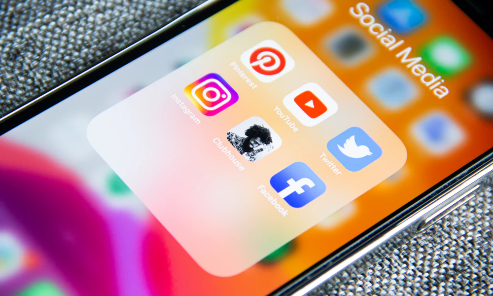 Social media apps on phone screen with content planning